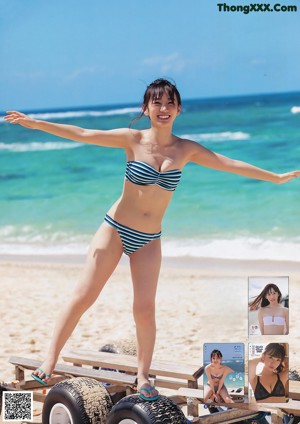 A woman in a pink bikini posing for a magazine cover.