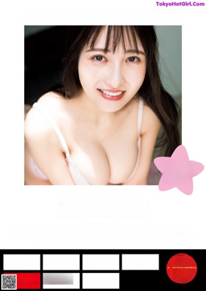 A woman in a white bra and panties sitting on a bed.