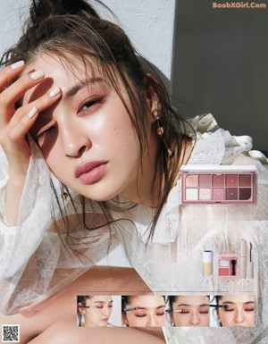 A magazine with a picture of a woman's face and makeup.